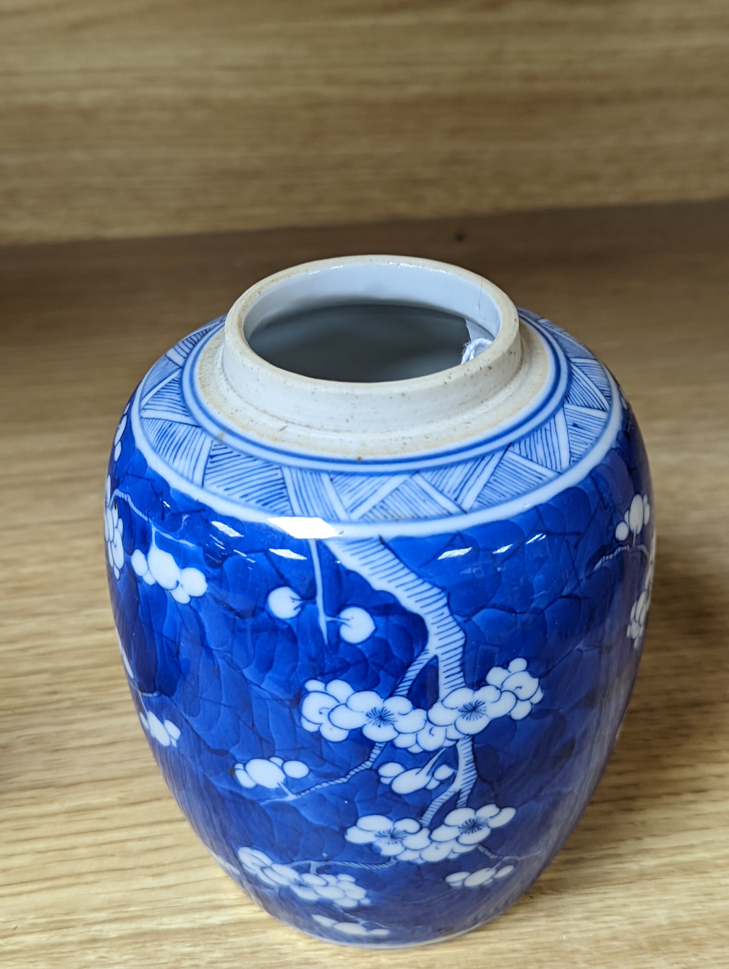 A 19th century Chinese blue and white prunus jar 13.5cm